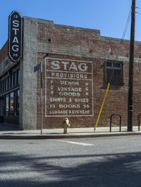 this is an image of a large brick building that has the words'stago studio and restaurant, in english