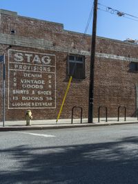 this is an image of a large brick building that has the words'stago studio and restaurant, in english