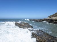 California Coastal Beach: Clear Sky and Sandy Shoreline