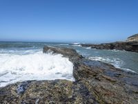 California Coastal Beach: Clear Sky and Sandy Shoreline