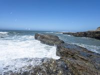 California Coastal Beach: Clear Sky and Sandy Shoreline