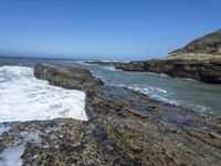 California Coastal Beach: Clear Sky and Sandy Shoreline