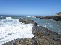 California Coastal Beach: Clear Sky and Sandy Shoreline