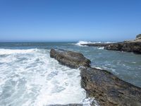 California Coastal Beach: Clear Sky and Sandy Shoreline