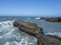 California Coastal Beach: Clear Sky and Sandy Shoreline