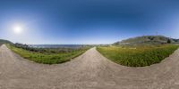 a 360 - pan of a mountain and a beach with houses in the distance are two images of a person standing on a bike and a path