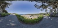 two fisheye views of the beach in a resort with trees and people in the water