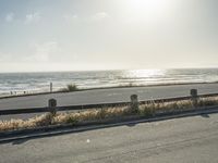 California Coastal Road with Gloomy Sky and Clear Ocean