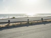 California Coastal Road with Gloomy Sky and Clear Ocean