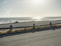 California Coastal Road with Gloomy Sky and Clear Ocean