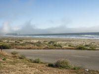 California Coastal Road Under Grey Skies and Fog