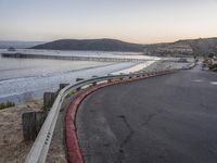 California Coastline at Dawn: Road Leading to a Pier