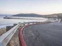 California Coastline at Dawn: Road Leading to a Pier