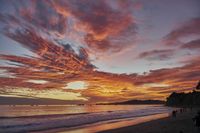 California Coastline at Sunrise: Water and Sand