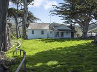 California countryside house with green lawn and open space