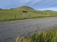 California Countryside Road with Lush Landscape and Blue Sky