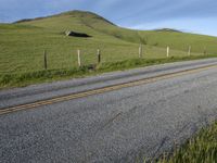 California Countryside Road with Lush Landscape and Blue Sky