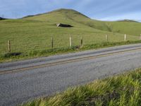 California Countryside Road with Lush Landscape and Blue Sky