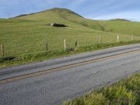 California Countryside Road with Lush Landscape and Blue Sky