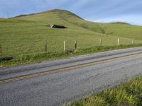 California Countryside Road with Lush Landscape and Blue Sky