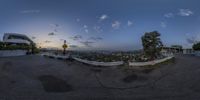 this is a 360 - view of a beautiful area with a church on it with the sunset in the background