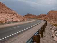 California Dawn: Clouds Over Asphalt Road