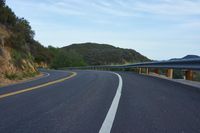 California Dawn: Scenic Road with Curves and Mountain Landscape