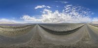 this is an 360 - vr image of the desert and clouds as it looks in an image you can see them from both sides