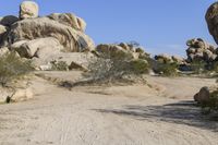 California Desert Road: Tracks under a Clear Sky