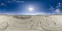 an image of a wide view of the desert from a fish eye lens looking down