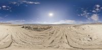 an image of a wide view of the desert from a fish eye lens looking down