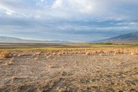 this is an image of a large dry desert in the united states of america the clouds are so blue and stormy