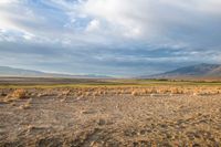 this is an image of a large dry desert in the united states of america the clouds are so blue and stormy