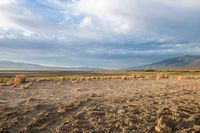 this is an image of a large dry desert in the united states of america the clouds are so blue and stormy