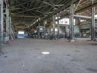 some machinery inside of a building with windows and a sign in front of them that says steel city