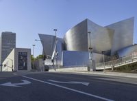 the building is designed with a complex structure and has a curved front and a curved tail