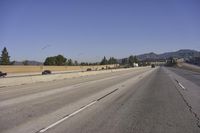 California Highway under Clear Skies with Trees