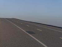 California Highway: Clear Sky and Asphalt