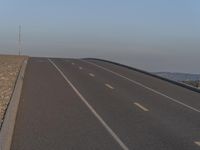 California Highway: Clear Sky and Asphalt