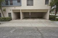 the driveway is empty of cars but it seems to be a nice place for parking