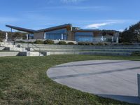 California House: Perched High on a Rock with Clouds Above