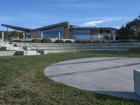 California House: Perched High on a Rock with Clouds Above