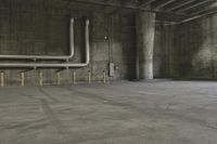 an empty industrial space with a bunch of pipes, benches and a parking lot inside