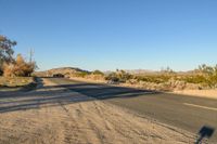 California Landscape: Endless Road Under a Clear Sky