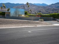 this is an image of a modern home in the desert with mountains in the background