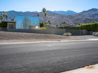 this is an image of a modern home in the desert with mountains in the background