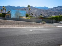 this is an image of a modern home in the desert with mountains in the background