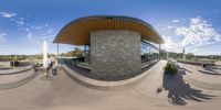 people riding bikes are gathered around the bus stop in a 360 - up style on their bikes