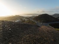 California Mountain Road: Dawn Light Illuminating the Landscape