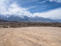 California's Mountainous Landscape: Dirt Roads and Clear Skies